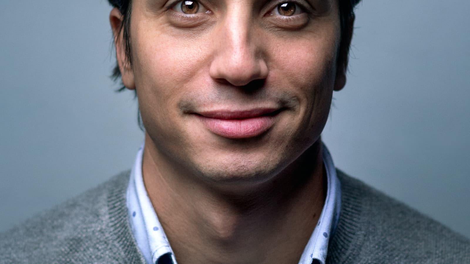 Portrait of a man in a Henley top, professional studio lighting