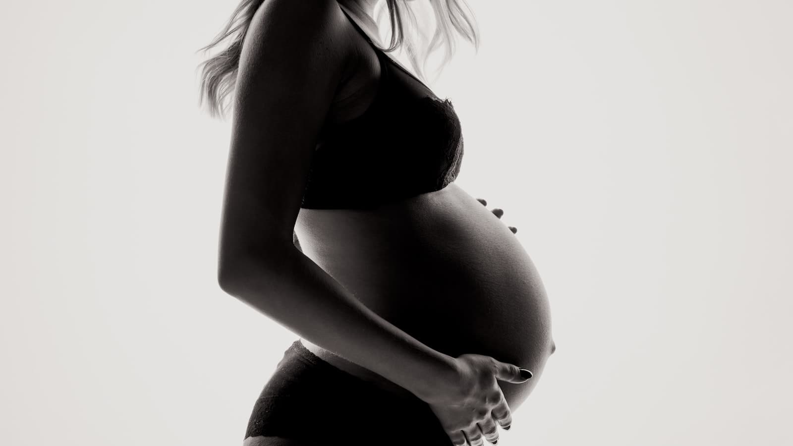 Maternity studio portrait with soft lighting