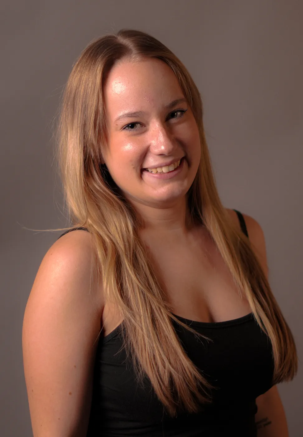 A young woman in a studio portrait