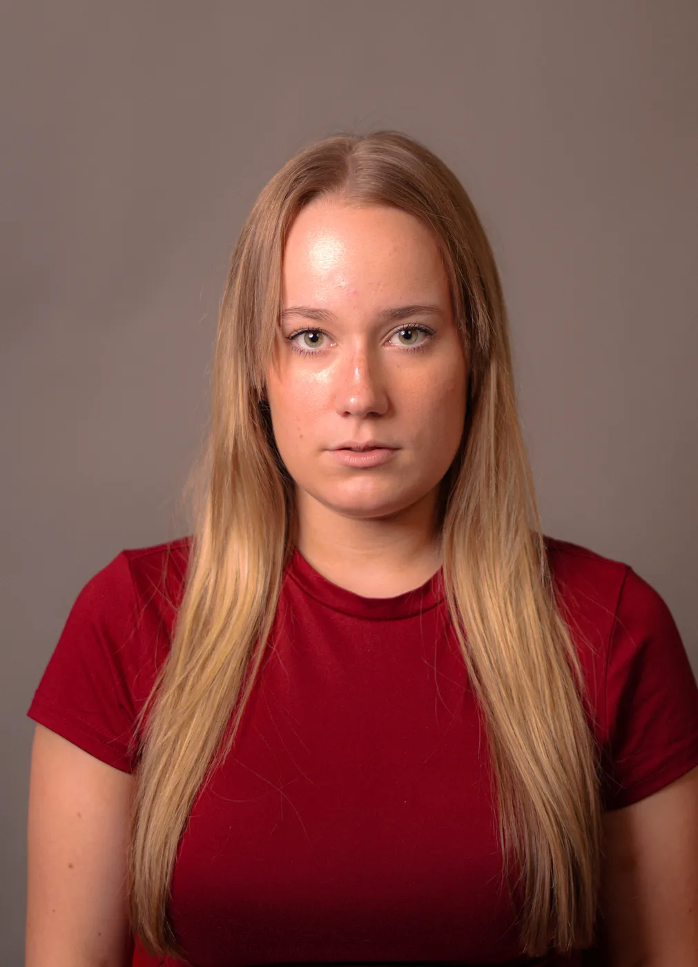 A young woman in a studio portrait