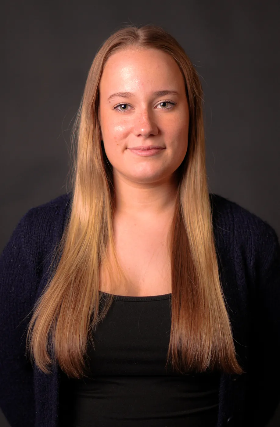 A young woman in a studio portrait