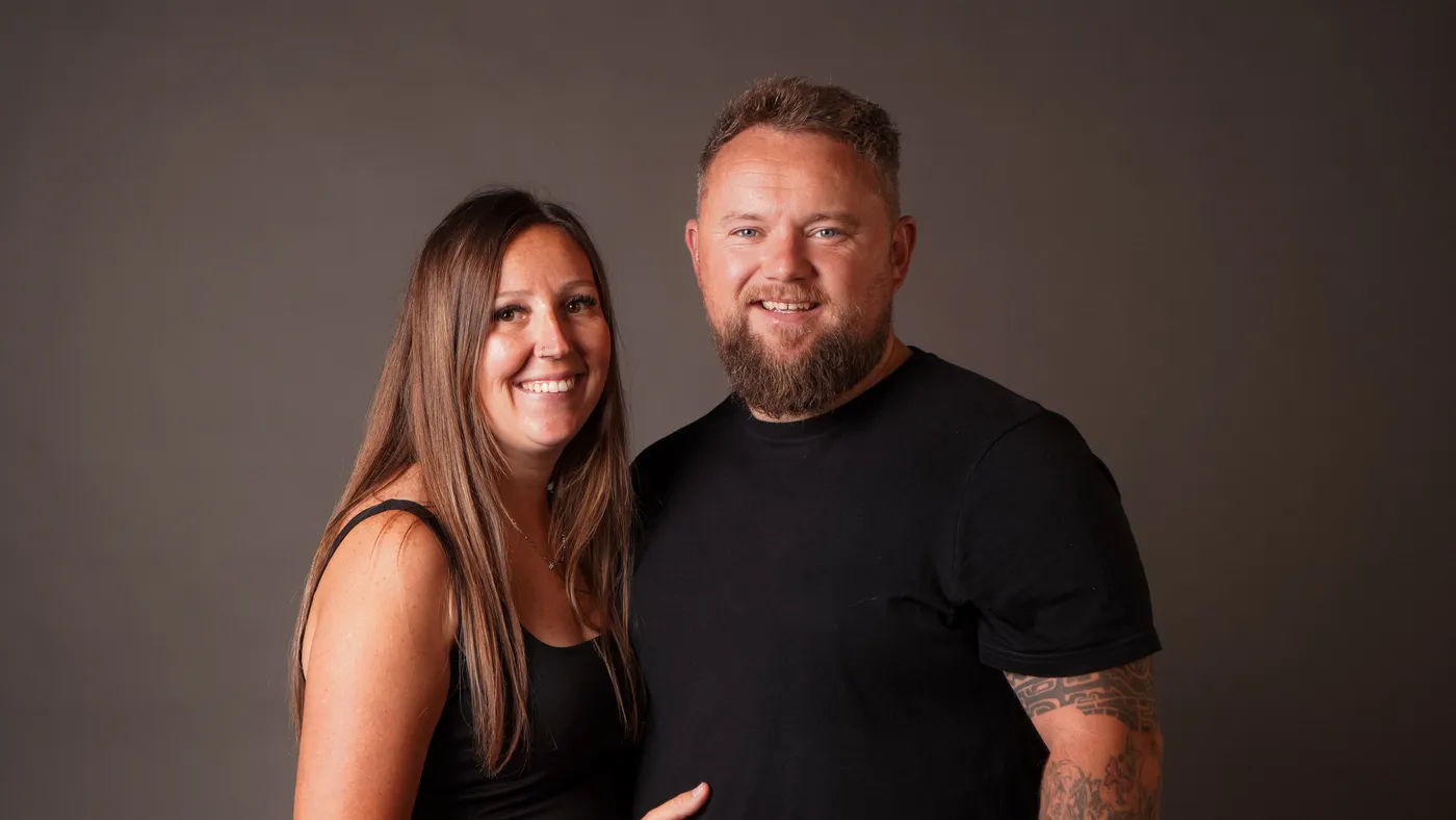 A couple photographed together in the studio